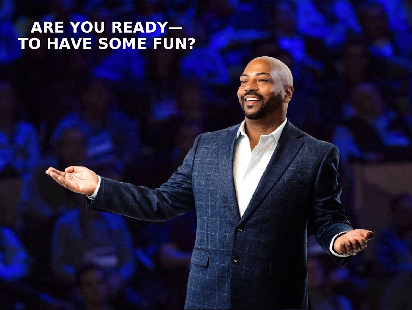 Charles Starr – Professional Keynote Speaker | Leadership, Legacy & Life Transformation Professional keynote speaker Charles Starr smiling confidently with open hands in a navy blue suit on stage. Text reads, “Are You Ready to Have Some Fun?”